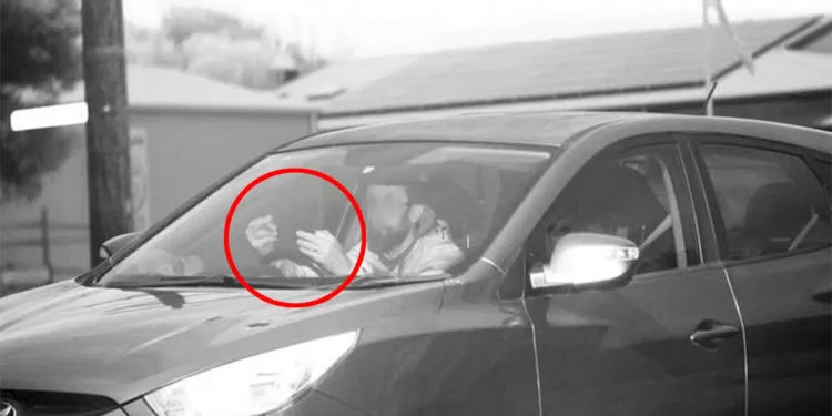 Victorian man fined for ‘flipping off’ mobile phone camera