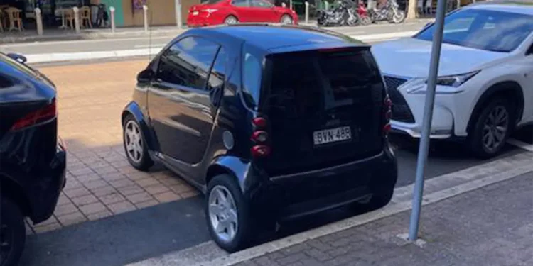 ‘Is this legal?’: Smart car driver caught beating the parking system